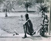 A Congolese man looking at the severed hand and foot of his five-year-old daughter who was killed, and allegedly cannibalized, by the members of Anglo-Belgian India Rubber Company militia for failing to make the daily rubber quota, Belgian Congo, 1904 [14 from www xxx india video company melayu