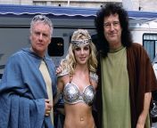 Roger Taylor and Brian May with Britney Spears during the making of the Pepsi &#34;We Will Rock You&#34; gladiator commercial in Rome, 2003. from brian com