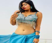 Neha Singh in a low rise saree from singh song a