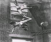 This photo was taken in Boston in 1975. In fact, it won the 1976 Pulitzer for photography. It shows a young woman and a little girl falling from 15 meters high. More info in original post. from michael boston