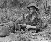 WWII. New Guinea Campaign. 26 April 1945. Private R. F. Gaudry, 2/3rd Battalion, 6th Division (Australia), in a forward pit at Kalimboa Village in the Aitape - Wewak area. (640 x 493) from village in girl toilet ghbit photo xxx saxymnisha six xx
