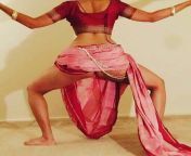 sari unwrapped in dance from red sari bridal in