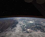 The snow-covered Himalayan Mountains and the bright city lights of New Delhi, India, and Lahore, Pakistan, are also visible below the faint, orange airglow of atmospheric particles reacting to solar radiation, taken from the International Space Station. from lahore pakistan xxx