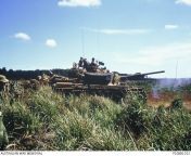 Nui Dat, South Vietnam, c. 1971. An Australian MkV/1 Centurion tank which has just fired its main gun during a firepower demonstration at Nui Dat. Note the Australian soldiers observing the shoot at the far left. from 3gb nui