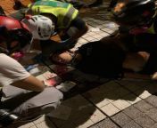 2155 Tin Shui Wai - two protesters hit in the head by tear gas round, one is unconscious. from shui qi