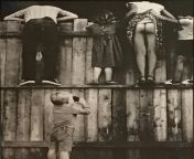 1950s - Boy Taking Photo of Kids on a Fence from boy lund photo