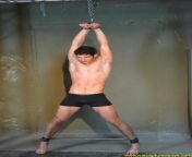 Prisoner handcuffed to the chain in the legs spreader bar prepared for electric tortures. A pic from RusCapturedBoys.com video Rent-a-Body II - Veniamin - Part I. from pakistan girls selfie video making part 4
