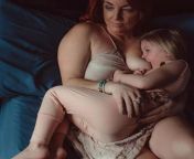 Mom and daughter breastfeeding from mom punish daughter with strapon