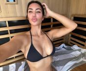 Kim Kardashian showing off her perfect tits from kim kardashian shows off her curves in a micro bikini 5