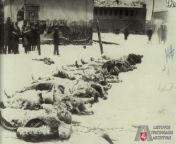 agar?, Lithuania. December 8th, 1945. Dead Lithuanian freedom fighters are laid out in the town square. from momo rap arthi agar