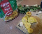 making patacones, while eating plantain strips while also making green banana ceviche. from florescent gf strips while