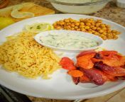 Just a food post! Basmati rice, roasted veggies, curried chick peas and raita. (Vegetarian, not vegan) tasty... from basmati d3si