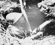 Japanese soldier killed in a hole in Pegu road by a British armoured column driving south. He is holding a 100lb bomb between his knees and is holding a piece of steel with which to detonate his bomb in a suicide attack as a living anti-tank mine. from famyli xxxtress anjali sex videouck in swamiji aunty in jaileos pakistani school girl within 10 xxx videomy porn