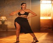 Nora Fatehi looking hot in black dress what a thick thighs ufff from nora fatehi sexy hot photoshoot