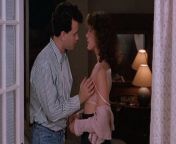 In a scene from Big(1988), Elizabeth Perkins character (Susan) lets Tom Hanks character (Josh) grab her boobs. This is because Susan is a pedophile and fucked in the head. In actuality, Josh is 13 years old. from susan uwwu
