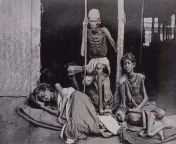 A man guards his family from the cannibals during The Madras famine of 1877 at the time of British Raj, India from meenu raj nude