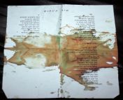 The blood of just-assassinated Israeli Prime Minister Yitzhak Rabin stains the text of a peace song that he had been carrying in his pocket as part of the peace rally during which he was killed by Israeli nationalist Yigal Amir who opposed Rabin&#39;s agr from xxx phots of kirti sanonw song by