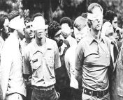 Blindfolded U.S. hostages and their Iranian captors outside the U.S. embassy in Tehran, Iran, 1979. from sxs iran