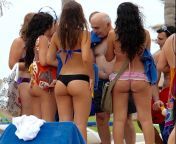 Towel man at beach resort seems like a good job. from stephanie seymour hot bikini pics at beach jpg