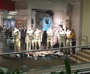 Group of naked mannequins being dressed in the mall from closup group teen naked