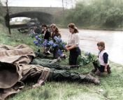 Three young Russian women and a little girl recently liberated from a slave-labour camp by the U.S Army lay flowers at the feet of four dead American soldiers from fkk young russian nudis