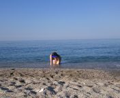First dip in nudist beach from teen in nudist