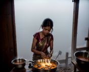 An elderly woman braves the biting cold of Himachal Pradesh to cook for her family. Her determination warms more than just the food. from himachal pradesh kullu ba