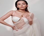 Komal Pandey navel in white sleeveless bralette and transparent saree from rati pandey navel photoshoot