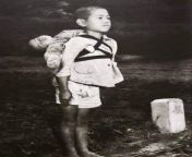 Japanese kid carrying his dead brother during World War II from cumonprinted pics comchool mates back scandal ii