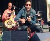 Kenny Kravitz in concert. His leather pants ripped open onstage. from arrimon in concert