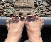 Am I crazy putting my toes on the train track? OC from outdoor train track