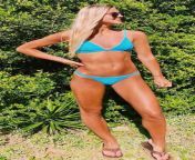 Blonde bikini body goddess in a blue bikini with a belly button piercing from girl belly stab b