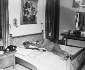 American soldier taking a nap on a bed belonging to German General Hermann Goering after elements of the US 3rd Army captured his lodge. Germany, May 3, 1945. from monique hermann