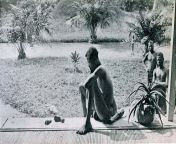 A Congolese man looking at the severed hand and foot of his five-year-old daughter who was killed, and allegedly cannibalized, by the members of Anglo-Belgian India Rubber Company militia. from india xxx company girls sex fog com