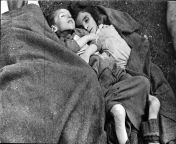 Two children lying dead after the liberation of Bergen-Belsen. Many inmates died in the aftermath of the concentration camps liberation; freedom came too late for them. from the liberation of auschwitz