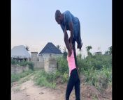 Strong girl lift man overhead walking up a hill from strong african girls lif overhead boy