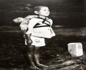 The Standing Boy of Nagasaki- taken in Nagasaki, shortly after the atomic bombing of that city on August 9, 1945, of a 10 year old boy carrying his dead brother on his back waiting for his turn at the crematorium from old boy fuck his sister