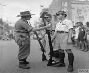 Posting WW2 stuff on a semi-regular basis until I forget I started doing it &#124; part 302: following Operation Tiderace, which saw the British reoccupation of Singapore, an English officer gives instructions to a pair of Malay policemen. September 1945. from malay indonesia hijab
