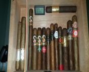 My first ever cigar humidor, and my first ever cigars. All of them are Brazilian (where i&#39;m from) exept for the Flor de La Vega Habanitos. The higrmeter is only for reference and i already know that it is showing up 4% more than what really is in the from 15 ever