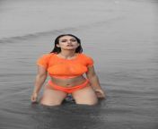 Neha Malik in orange bikini from malik in bathroom