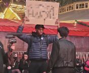 This guy held a sign spoiling the film outside the movie theatre LMAOOO (YouTube: Lizwani)LinkInComments from blue film songs bangla movie