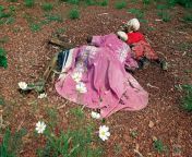 A murdered mother and her child during the Rwandan Genocide. May 31, 1994 [1500x981 ; from mother black 65