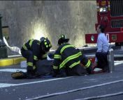 Never before seen photo of firefighters retrieving the broken body of a WTC jumper. Photo courtesy of 9/11 WTC Archives from juthika xxxxx photo of sonagachi