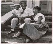 Brooklyn Dodger baseball star Jackie Robinson holding his young son Jackie Jr. on his lap as he sits with his wife Rachel on front steps of their home, Brooklyn, New York, 1949. Photo by Nina Leen. from jackie appiah porn videoaysha rizrose