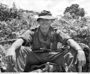Vietnam War. Bien Hoa Province. August 1965. Corporal Alf Law of 1st Battalion, Royal Australian Regiment (1RAR), relaxes on the outskirts of Ong Huong village. (640 x 649) from bipsha bashu fuck village hindi x