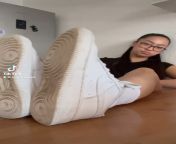 Asian TikTok Girl removes her shoes and socks from indan tiktok girl
