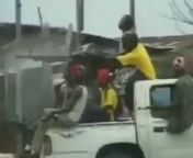 Liberian rebel manning a gun on a truck packed with soldiers gets shot dead. Liberia, Africa. 2003 from linda liberia bbw