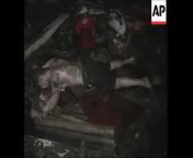 Footage of rescue workers removing bodies from the scene of the 2002 Bali bombings that killed 202 people and injured 209. The bombings, carried out by Jemaah Islamiyah, primarily targeted two packed nightclubs frequented by westerners (GRAPHIC) from muslim bali