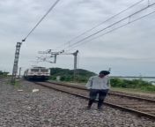 TikTok video of a B.Tech student trying to shoot the video on a railway track for TikTok on Sunday. A high-speed train collided beside the track near the Kazipet railway station on Sunday. from tiktok alt