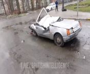 Footage from Bucha, Kyiv shows a man still in his crushed car. from forged in fire crushed car chan